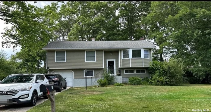 Hi Ranch 4 bedroom, 1.5 Bathrooms, Living Room, Dining Room, EIK, Updated Electric, New Electric Hot water heater. Gas heat, 1 Attached garage , Hardwood floors, Sunroom, large yard , all information to be veified by all parties