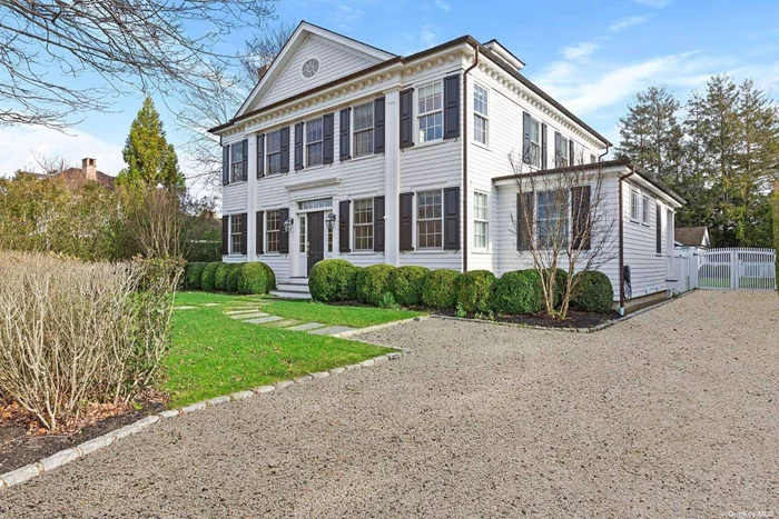 Beautifully fully-renovated Village home, a half mile to Little Plains beach, and in the heart of Southampton Village. Solidly-constructed Federal-style home designed by renowned known local Architect Brian Brady. The house is perfect for entertaining, both indoors and out. The interior has 7 bedrooms and 9.5 on 4 levels. A large and open state-of-the-art eat-in-kitchen, living, sitting room and a formal dining room, a media room/den, bonus room and more. The living area is framed by floor to ceiling glass sliding doors, which lead to an inviting deck complete with a large dining table, a sitting area and covered by an elegant awning assuring some shade for sunny summer days. A brand new pool house with full bath adorns the large heated gunite pool. Tastefully done and thoughtfully curated, this home epitomizes the Southampton Village residence only minutes to the best and most beautiful beaches in the world, as well as the best Hamptons restaurants and stores.