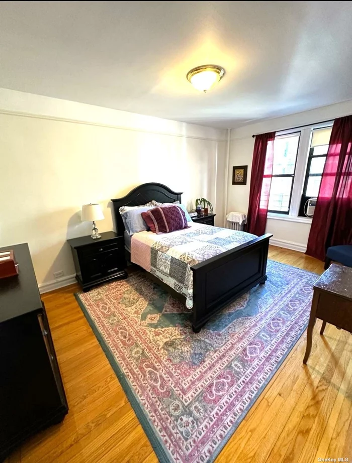 Motivated Seller! Spacious one bedroom with a large living room and tons of closet space throughout. Eat in kitchen, hardwood floors and high ceilings add to the pre-war charm.  Building is located in the Norwood section of the Bronx, features lush garden courtyard, live in super, laundry in the building and elevator.  Close to transportation and major highways, 4, 2 and D trains, Local and express buses 10, 16, 34, 28 and 38. Metro North is 3 blocks away. Montefiore Hospital is 1 block away.  Right next to Historical Williamsbridge Oval park which includes a running track, playgrounds, sports fields, tennis courts and a skate park.  Sorry no dogs, cats ok.