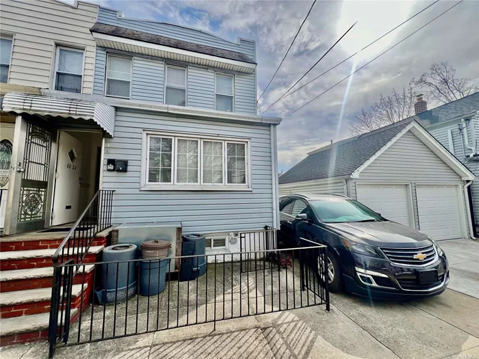 Welcome to 60-24 62nd Ave semi-detached legal two family property. This house features three bedroom over two bedroom, with a full finished basement. Private driveway. Great location , close to stores , schools and restaurant on Metropoltan Ave. Great for investor or owner user !