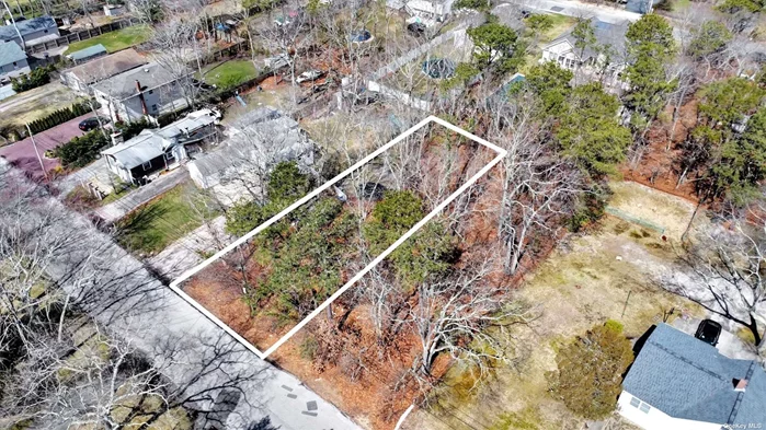 One of two adjoining, separate building lots in Flanders, the Town of Southampton! Purchase together and build one home, or buy one of the two lots and build your desired home. So close to both the Hamptons as well as the North Fork! Plentiful shopping in nearby Riverhead, including the Tanger Outlet Center, as well as proximity to schools, medical facilities, golf courses, beaches and wonderful restaurants. Priced to Sell!