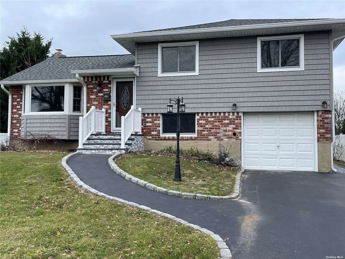 Renovated Spacious 3 Bedroom 1 Bath, Kitchen With Granite Countertops, Stainless Steel Appliances, Hardwood Floors, Private Driveway, Garage, Utilities Included, Except Cable & Wifi. Close To All, Minutes To Babylon Village & LIRR.
