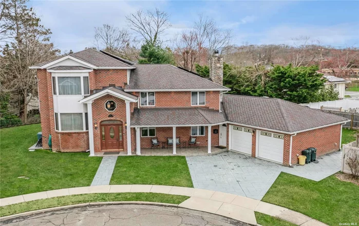 Spectacular Completely Remodeled Split-Level Home Located On A Cul-De-Sac In The Heart Of Syosset Featuring Approx 2, 986+ Interior SF With An Open Floor Plan, A Bright Cathedral Entryway Flows Into A Large Welcoming Family Room W/ Wood Burning Fireplace, An Office/Guest Bedroom W/Full Bath And Sliding French Doors Leading To The Oversized Backyard Patio Area. Second Level Features A Living Room, Formal Dining Room And An Eat-in-Kitchen W/Granite Countertops, Under Cabinet Lighting, Stainless Steel Appliances W/Gas Cooking And A Breakfast Nook W/ Sliding Doors Leading To Backyard Patio. Third Level Is The Original Primary Bedroom W/Large Double Closet, 2 Addt&rsquo;l Bedrooms And A Full Bath. The Fourth Level Features The Primary Suite W/Jacuzzi Tub Bath, Separate Shower And Walk-In Closet. Partially Finished Basement Features Laundry W/Pantry Closets And Refrigerator. Oversized 2-Car Attached Garage W/Cabinetry And Pull-Down Stairs For Full Attic Storage, Fully Owned Solar Panels, Cover Current Electric Usage Charges, The Home Boasts Oak Flooring And Radiant Heated Floors Throughout, 3-Zone Central Air,  In-Ground Sprinklers, Andersen & Pella Windows And Doors, Tons Of Closet Space And So Much More. In Close Proximity To LIRR And Shopping. This Home Is A Rare Gem!
