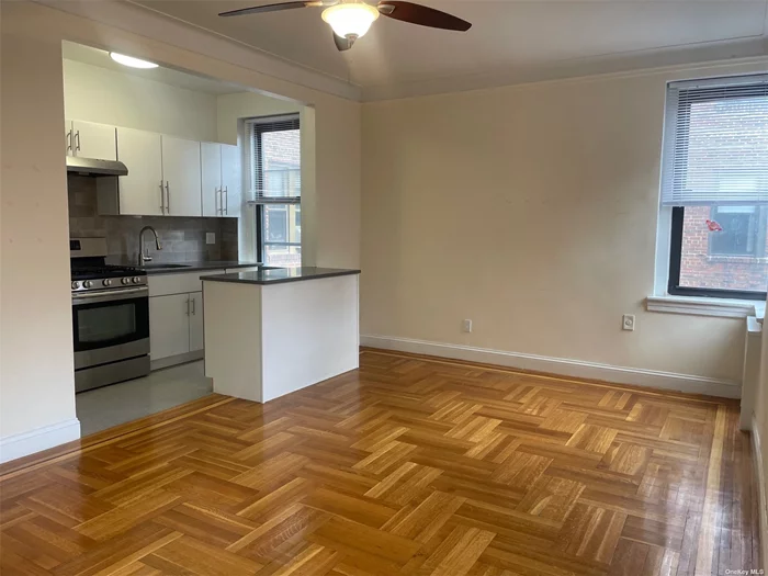 Stunning LARGE studio apartment. Lot of closets throughout. Large bathroom, gourmet kitchen with island. Corner of Skillman Ave and w41st St. Across the street from P.S. 150. Steps to parks, restaurants, shops. Laundry in basement