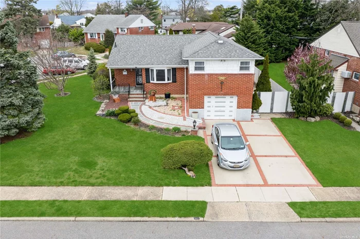 Location! Location! Opportunity Knocks! Nestled In A Desirable Massapequa Neighborhood, Siding A Cul-De-Sac On Oversized 90 x 100 Property & Offering Plainedge Award Winning SD# 18. Bring Your Imagination & Create Your Forever Dream Home! Welcome To This Unique Brick Split Level Style Featuring An Open Concept Floor Plan, A Front Porch, Step Down Living Room & Step Up Formal Dining Room. Maple Wood Cabinets In Kitchen With Granite Countertops, Spacious Family Room Behind Garage, 3 Bedrooms, 2 Bathrooms, Some Windows Updated, Oak Flooring Under Carpeting, Shed Is A Gift, Hot Water Heating System Installed 2014, Roof Installed 2013. THIS WILL NOT LAST! HURRY!