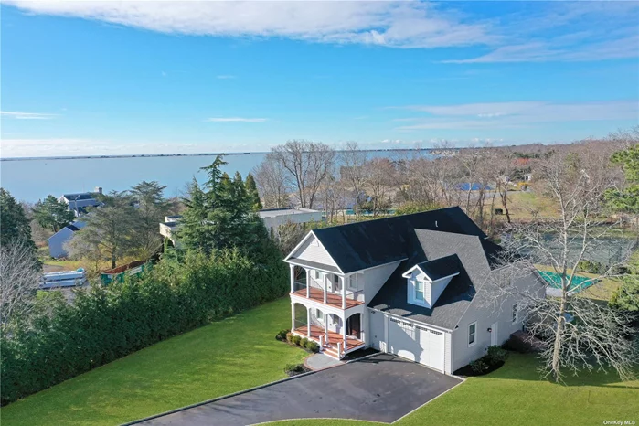 Welcome to 64 Romana Drive, where luxury and comfort meet in this stunning Hampton Bays home. This 2-story, 2, 805 square foot retreat built in 2016 offers 4 bedrooms, 3.5 bathrooms, and is nestled on over 3/4 of an acre, providing ample space for gracious living and entertaining. Step outside to discover the outdoor oasis, featuring a 50&rsquo; x 20&rsquo; heated saltwater pool (9&rsquo; deep end), USTA har tru tennis court, and an outdoor shower. The western exposure ensures you&rsquo;ll experience stunning sunsets and natural light throughout the day. As you step inside, you&rsquo;ll be greeted by the spacious and light-filled living areas, perfectly designed for both relaxation and hosting guests. The first floor features an office and a junior primary ensuite, offering versatility and convenience. The gourmet kitchen and dining areas seamlessly flow into the living room, as well as the mahogany deck leading you to the pool and tennis court, creating an inviting space for gatherings and everyday living. Upstairs, the primary ensuite features a western facing balcony, a custom walk-in closet, and a spacious bathroom with both a stand-up shower and a separate jacuzzi tub. One of the additional 2 upstairs bedrooms offers an eastern facing balcony, with water views. Lastly, the laundry room is conveniently set on the upper level beside the oversized bonus room above the 1-car garage which provides additional space for various needs. With a full basement, there&rsquo;s plenty of room for storage or creating a personalized space to suit your needs. Don&rsquo;t miss the opportunity to make this remarkable property your own and experience the best of Hampton Bays living, including the nearby Tiana Shores Association beach club. Schedule your visit today and discover the endless possibilities that await at 64 Romana Drive.
