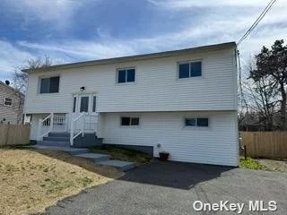 Just move in to this totally renovated upstairs of a hi-ranch. Beautiful eat-in-kitchen with stainless steel appliances, 3 bedrooms, 1 full bath, L-shaped living room and dining room.