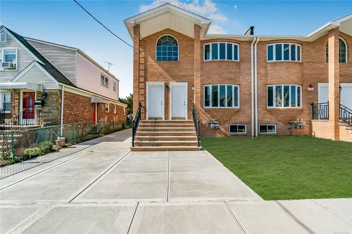 Brand New build Brick two family house. Hardwood floor, Custom design kitchen, Large windows. High ceiling basement with big windows. Split units A/C installed in each room. Solar panel will be installed. Front door face East.