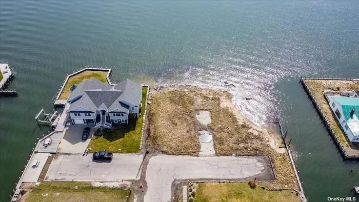 A prime offering with exceptional potential - available for the first time in over 6 decades - one of the last remaining vacant waterfront lots in the Inc Village of Babylon and lovely Frederick Shores, a South Shore lifestyle community. Approximately 70&rsquo; of frontage on the Great South Bay, with absolutely stunning panoramic views out toward Robert Moses Causeway, Captree, & Oak Island. The Fred Shore Beach Club (dues) offers residents a private beach, pavilion, playground & BBQing area, and a vibrant social calendar. Potential to purchase 57 jointly with 61 E Shore (adjacent lot with bay frontage AND approximately 90&rsquo; of canal frontage, which would afford a total of .33 acre. New 2024 survey to be available shortly. Property is under surveillance. It&rsquo;s kindly requested that you DO NOT walk the property without permission from the listing agents. Thank you for your cooperation!