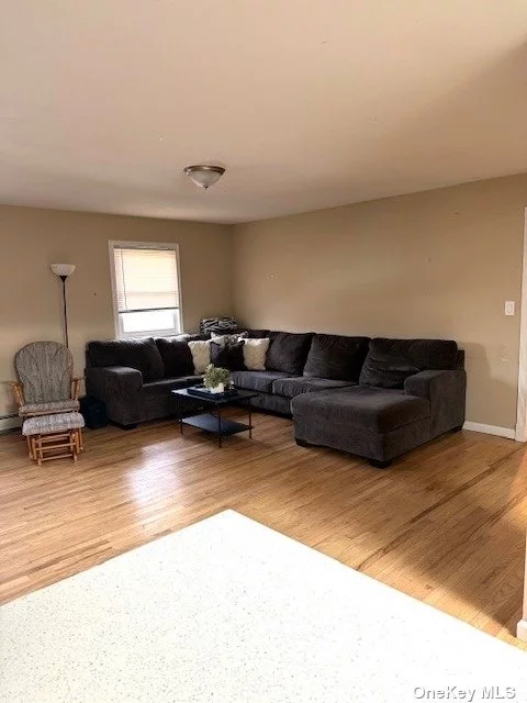 Super spacious and bright, second floor apartment for rent. Unit will be available for May 2024. Beautiful hard wood floors - open floor layout. Updated kitchen with stainless appliances, quartz counters and skylight. Breakfast Island. Separate area in kitchen for dining as well. Heat, electric and water included. Patio area. Off street parking.
