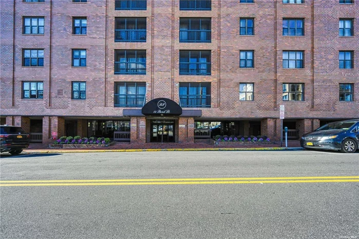 Luxury doorman building in the heart of town. Sunny 7th floor 2 bedroom, 2.5 bath Condo facing front(East) in Bond Parc Building, one block from LIRR to NYC. This Luxury apartment features hardwood floors, a large kitchen with breakfast area, heat included, laundry room in the unit. many big closets, balcony, . 24 hr. doorman, 1 parking space included, recreation room, bike and storage room and gym. Enjoy the Great Neck Park District. Amenities waterfront park, pool, ice skating and sport center & more. must see!.