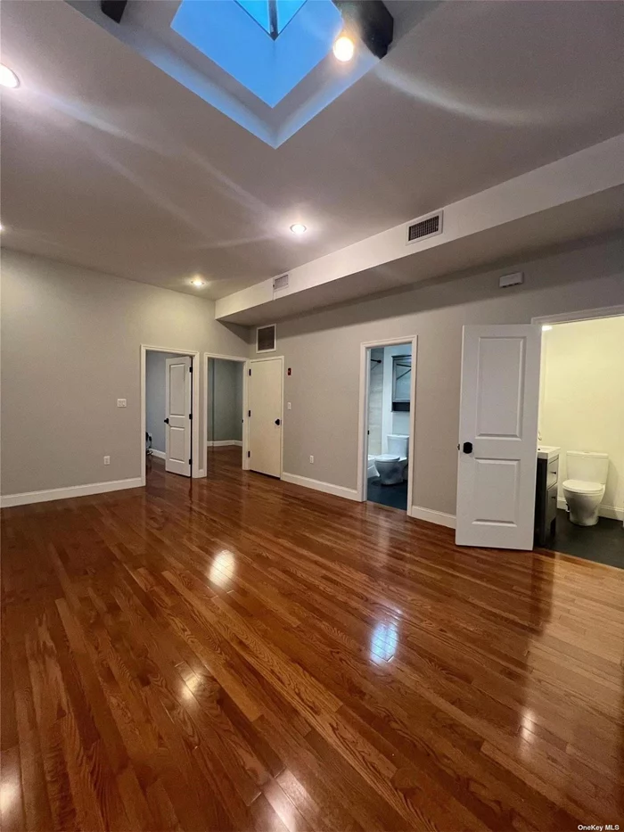 Excellent location!Beautiful four bedrooms and 1.5 bathrooms on second floor. The apartment features open kitchen, skylight, hardwood floor throughout, dishwasher, Central A/C,  stainless steel appliances, in unit washer and dryer. Close to all. Minutes to M train and bus station.Income and Credit checks. A Must See!