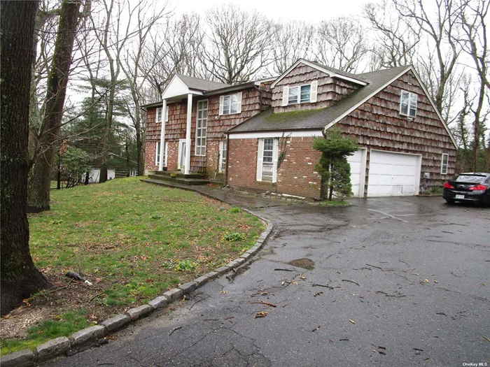 Large Center Hall Colonial, Large Rooms, Wood Floors, 3 Car Garage, approximately 4000 sq. ft.