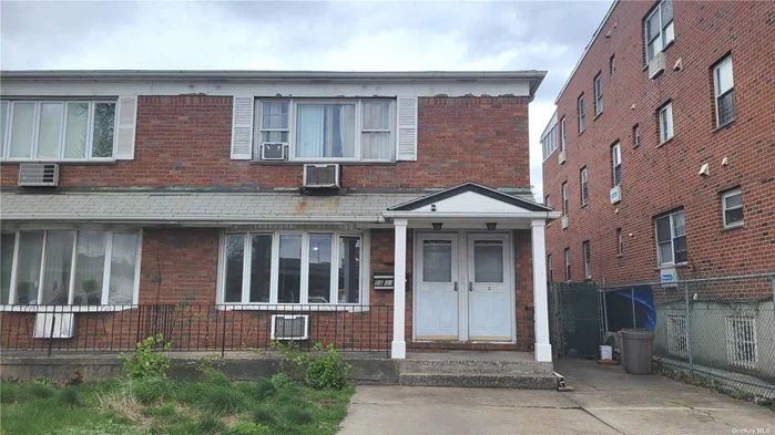Prime location near downtown Flushing. Solid semi-detached brick 2 family house near major highways, parks, hospitals, shops, restaurants and more. Each family has 3 bedrooms and 1.5 bathrooms. Large and sunny Livingroom, formal dining room, big kitchen with window and ventilation hood. Partially finished basement has separate entrance and walk out to a private fenced backyard. Front has 2 parking spaces plus a very long driveway. Gas heating and cooking, hardwood floor throughout, updated kitchen and bathrooms. Boasting 2200 interior sq ft. Great for investment or self-use. Truly a gem ! Won&rsquo;t last !