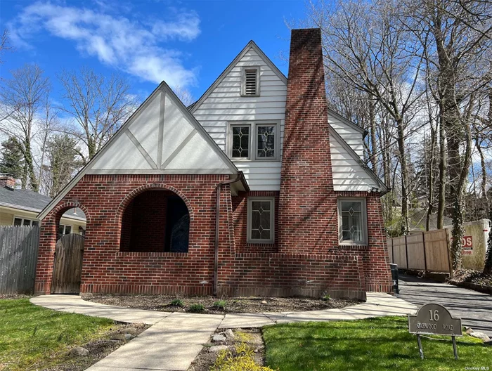 Meticulously renovated English Tudor in Huntington Village. Living Room with Fireplace, Dining Room with built-ins, EIK with granite countertops and pantry, Den with sliding glass doors to backyard. Side door entrance leading to a mud-room and powder room. Upstairs there is a primary en-suite and 2 additional bedrooms, Full-Bath. The lower level is fully finished with a laundry room and full bath. There is a two car detached garage and plenty of parking. Full house generator