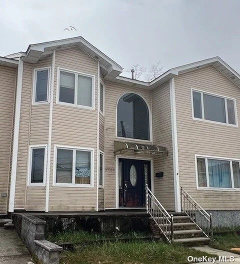EXTRA Large TWO Family In HOWARD BEACH On Oversized 90&rsquo; x 80&rsquo; Lot. It Features Five Bedrooms & Three Bedrooms Duplex Plus Spacious One Bedroom Apartment Situated Above TWO CAR GARAGE. There Is EXTRA PARKING On A PRIVATE DRIVEWAY. This Property Was Build In 2004 And It Offers Hardwood Floors, Central AC, Andersen Windows And Much More!