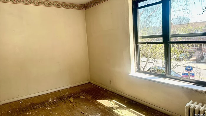 JUST REDUCED!!! LOW MONTHLIES!!! SUPER BUILDING!!! OWNER SAYS SELL!!!***** SUN-DAPPLED OVER-SIZED ONE BEDROOM AWAITS YOUR TLC.***** PRE-WAR DIMENSIONS AND HIGH CEILINGS......A RATED NYC ENERGY GRADE!!! Best one bedroom layout in all of Bath Beach!  LOCATION, LOCATION, LOCATION---BUILDING IS NEXTDOOR TO THE NEWLY RENOVATED BENSONHURST PARK, WITH THE GEORGEOUS WATER VIEWS OF THE SHORE PARKWAY GREENWAY CLOSE BY. Southern and Eastern Exposures, bright and sunny, over-sized eat-in windowed kitchen with pantry. Original oak hardwood floors with mahogany inlay. (Need refinishing.) Four over-sized deep closets! Professional laundry room, live in super. Gorgeous Art Deco Lobby, Secure Package Delivery. Low Maintenance! (Heat and Hot Water included.) Centrally located in Bath Beach---Five minutes to Verrazano Bridge! Caesar Bay Bazaar shopping center nearby on Shore Parkway, convenient access to food shopping, restaurants, public transportation (D subway, BUS STOP OUTSIDE: B6, B82, X28, X38) SOLD AS IS.