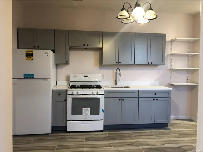 Large renovated 3 bedroom apartment. Hardwood floors throughout and newly renovated kitchens and baths. Property is located a short walk to the train station and area shops. Heat and hot water included in the rent.