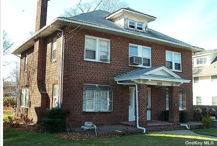 Large Brick Colonial home situated on immense property in what is zoned as residential or business. This property can be a beautiful home or business. The location is excellent in the heart of Woodmere.
