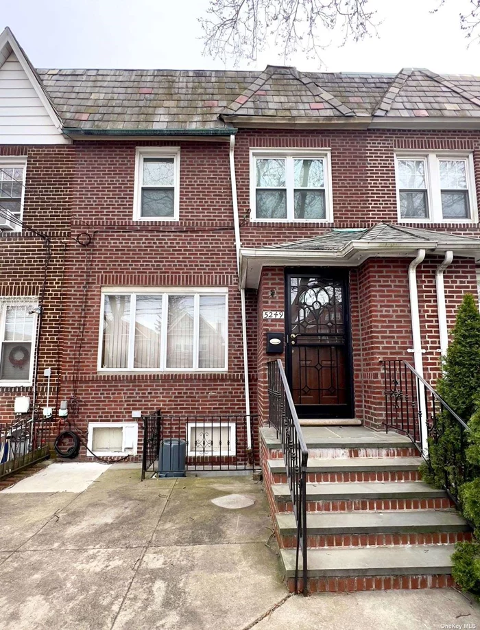 Attached single family solid brick home on a great block in Maspeth. Excellent location around the corner from local shopping and transportation. This home features, 3 bedrooms, an attached garage, private parking, finished basement and more. Spacious home built 19&rsquo; wide by 35&rsquo; deep. Around the corner from the Q18 bus and C Town supermarket. Close to PS 229. Update to your taste!