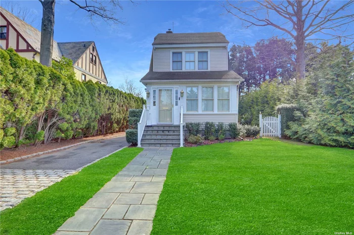 Discover the charm of this beautifully renovated Colonial home in the sought-after Adelphi Section of Garden City, completed in 2018. This property offers a versatile living space with a spacious first-floor layout that includes a living room, formal dining room, and a newly updated eat-in kitchen with direct access to a lovely yard and patio-perfect for entertaining. Upstairs, enjoy the flexibility of a primary bedroom, additional bedroom or office space, alongside a modern full bath. The third floor provides additional room that can serve as an office or extra bedroom. The finished basement features a half bath, laundry, ample storage, and a new recreation area. A long driveway ensures plenty of parking. Conveniently located near the LIRR, shops, and parks, this home blends comfort with modern living in an ideal setting.