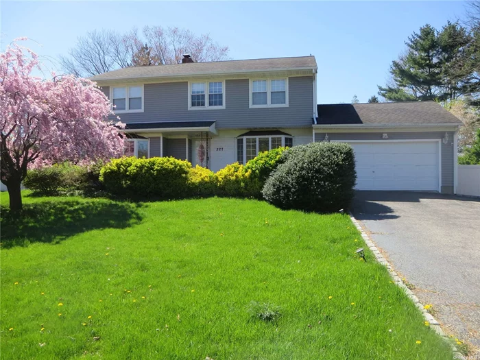 Spacious colonial located in the Commack sd. JUly 1st occupancy. Home office or small 5th br on first floor. Hardwood floors throughout; no carpeting. Extended king sized primary br with walk-in closet and fbth with shower. 2 car gar with interior access. Oversized driveway with ample parking. Ground care incl. Central air. Gas heat and gas cooking. Family rm with fpl. Cherry cabinets with granite c-tops & S/S appliances. D/R. Shy 1/2 acre with oversized wood deck (going to be painted). Some fencing. Commack high school located diagonally across the street. Take advantage and go for your daily run on the track! Landlord req good credit and income verification.
