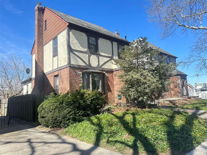 Whitestone Tudor style with C/O 2 family. Great Location, close to school, public transportation. Full finished Basement has separate entrance. First floor with 2 bedroom and 1 bathroom. Second floor with 1 bedroom and 1 bathroom.