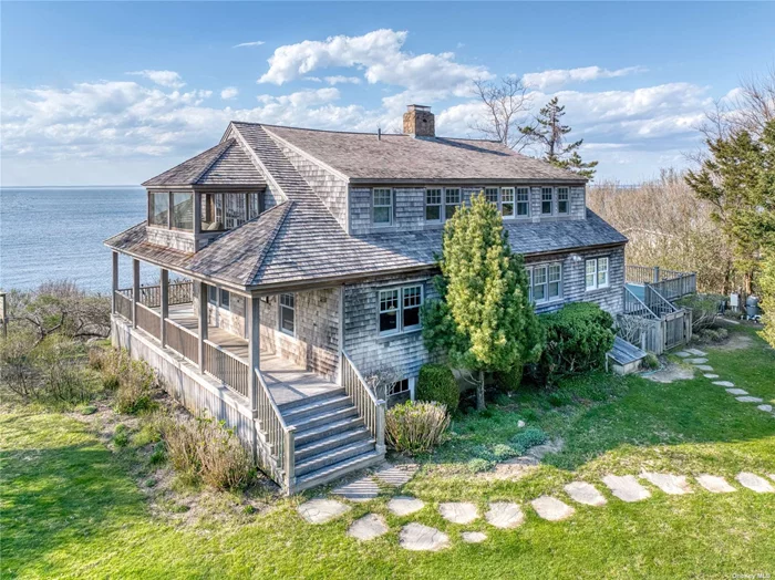 Stunning Waterfront shingle style home overlooking Long Island Sound. Private beach access. Waterview, heated pool. Wrap-around porch. Original beach stone fireplace, vintage beadboard walls, large, updated gourmet kitchen, open common area, 5 bedrooms, 3 bathrooms, large master ensuite with private screen water view balcony. Beautiful interior furnishings, with teak rocking chairs, chaise lounges and picnic table on porch and pool area for entertaining. Close to Orient Village amenities, marinas, Country store, Yacht Club, and bay beaches. Offered Aug-LD $55, 000; Sept 5-30 $25, 000. Permit# 1108.