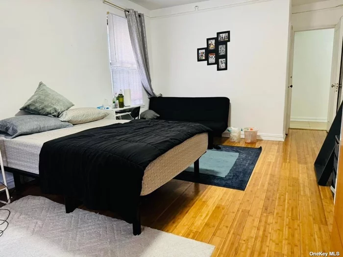 Large, spacious 1 Bedroom coop around 850 sq feet, could be use as 2 Brs, corner building of Boardway and Vietor Ave. Walk To Queens Center Mall, Walk to M, R, 7 Train, Buses Q58, Q53, and Restaurant, Library, Supermarket. Mint Condition. Convenient to all...Must see...