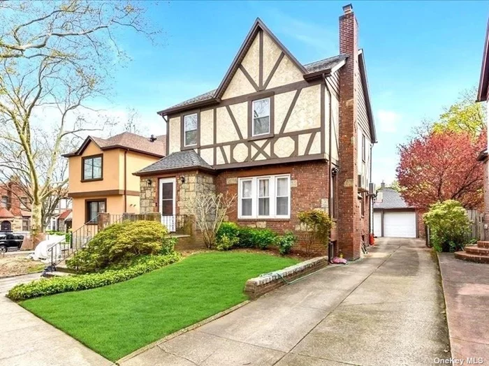 SPARKLING BRICK DETACHED TUDOR COLONIAL IN EXCELLENT CONDITION !!!! SPACIOUS LIVING RM WITH FPL & FORMAL DINING RM.3 BEDROOMS & 2.5 BATHS + FINISHED BASEMENT. 2 CAR GARAGE. LOVELY BLOCK NEAR ALL & WALK TO LIRR & BUS Q27 TO FLUSHING !! HURRY DONT WAIT!! THIS IS GREAT ONE ! Great Flow Of Entertaining. Exceptional Opportunity ! Best School Dist#26 Ps203 Prime Bayside Location !