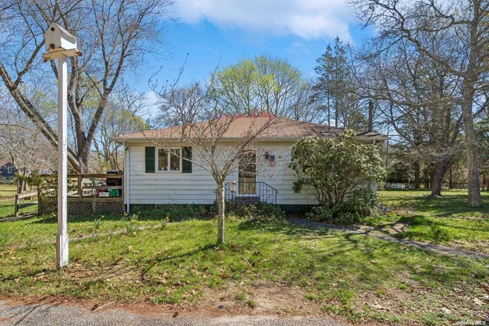 Older 2Br, 1Full Bath, Living Room, EIK, Basement on a Huge, Almost an Acre Beautiful Lot! Needs a Lot of TLC. In Close Proximity to Town, Shops, Peconic Bay, Beaches. Excellent Opportunity to Build Your Dream Home.