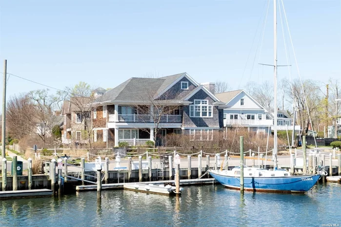 **Exquisite Nantucket Style Cedar Shake Home with Breathtaking Waterviews** Perfectly situated on one of the most coveted streets in Greenport Village, this 3-bed, 5-bath home has a commanding presence and is positioned perfectly to enjoy wide views of Stirling & Greenport Harbor. Step inside to discover a thoughtfully designed upside-down layout that places the main living areas on the upper level, maximizing views of the surrounding waters and enhancing the feeling of openness and natural light. Meticulously crafted with attention to detail, this residence boasts white oak wood floors that exude timeless charm and vaulted ceilings anchored by wood beams for a touch of rustic elegance. The lower level features 2 en-suite bedrooms, a cozy den and laundry. Upstairs has an open floorplan featuring a gourmet eat-in-kitchen with high-end stainless steel appliances & a walk-in pantry, a dining room with water views in every direction, and a living room with a gas fireplace. Through sliding glass doors, step out to the mahogany waterside upper deck to soak in the maritime ambiance or enjoy al fresco dining with a view. Outside, the fully fenced grounds with mature & manicured landscaping create privacy for a peaceful outdoor retreat, all while the vibrant village life awaits just moments away. Ask about the dock slip available for rent. Come see for yourself! It&rsquo;ll be worth your time!
