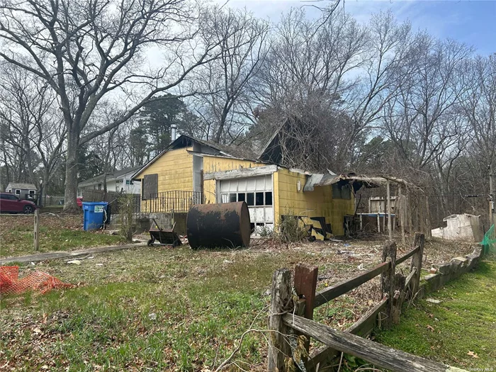 Previously at 3 Bedroom 1 Bath home w/ Garage and Basement. Foundation good. Home had electrical fire. Sold as is with remaining house on land. Sold AS IS