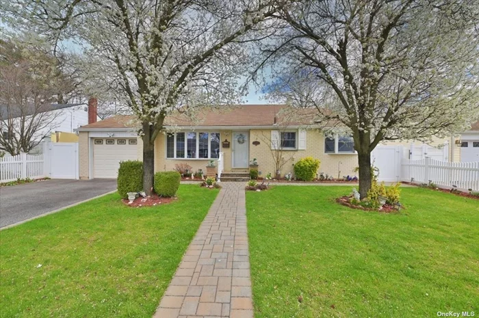 Charming & Surprisingly Spacious Expanded Split Level Home Set On Oversized 60&rsquo;x128 Lot Located In The Heart Of Massapequa Park. This Home Features New Heating System, New Ac Units, Eik W/Wood Cabinetry, SS Appliances & Island With Quartz Countertop & Extra Seating, Formal Living Room, Dining Room, Family Room, Bonus Room, 3 Bedrooms, Office/4th Bedroom, 2 Full Updated Bathrooms, Den, Laundry/Utility Room, Fully Fenced In Private Yard Perfect For Entertaining Or Just Relaxing. Close To Schools, Shopping, Restaurants, Parks & Transportation. Welcome Home ;)