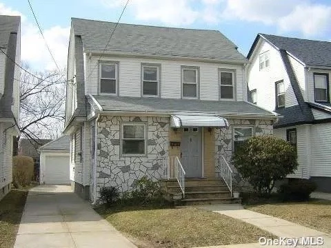 Beautiful Single family house located within a block from Hillside Ave in Hollis, featuring 4 bedrooms, 2.5 Bathrooms, Livingroom, Formal Dinning, Kitchen, finished basement, walkup attic, a pvt driveway and 2 car detached garage. House needs some TLC. Selling as-is. Vacant. Walking distance to numerous Buses, LIRR, Shopping, Groceries, Supermarkets, Schools, and all other community amenities.