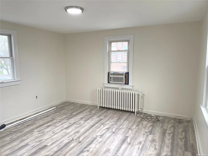 Newly Renovated Sunlight filled large 2br apartment on 2nd floor, large windows for ample of natural lights,  All Utilities are included, new floors, freshly painted, new ceiling lights, coin Operated laundry machine available in this property, gas cooking and gas heat, parking available, convenient location to All!!
