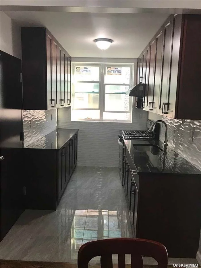 4 bedroom and 2 full bathroom on second floor. updated kitchen and bathroom with hardwood floors throughout. Close to La Guardia Airport, Grand Central Parkway, BQE and Public Transportation And Commercial Street only water included. tenant pays for electric, gas, heating, hot water.