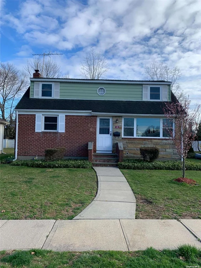 Dormer Cape in the heart of Syosset. Home offers brand new bathrooms, windows, and central air. All Floors in house were updated 2 years ago. Updated kitchen! Two large rooms upstairs.  Partially finished basement with washer and drier. 10-minute walk to Train Station. Available May 1.
