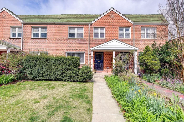 Beautiful brick Colonial in prime Forest Hills location. Spacious with updated kitchen & lovely hardwood floors. Near transportation, shops and schools.