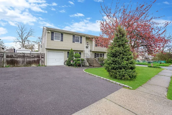 Welcome to this beautiful high Ranch located in Ronkonkoma in the Connetquot school district. The first level, which was completely renovated in 2019, features two bedrooms, a beautiful full bathroom, a den, a sitting area with a bar, a laundry room, and access to the garage and outside entrance. The second floor offers three bedrooms, one full bathroom, EIK, a dining room, a den, and sliding glass doors that lead to a deck with stairs to the backyard. The backyard boasts a beautiful inground pool with a new liner that is only three years old, a Jacuzzi, and beautifully landscaped grounds. This home is ideal for a large family or an extended family with proper permits, providing everyone with their own privacy. It also features a brand new heating system, a central system that is only three years old, upgraded electric, brand new entry and storm doors, and newer appliances. Don&rsquo;t miss out on this opportunity, as it won&rsquo;t last long.