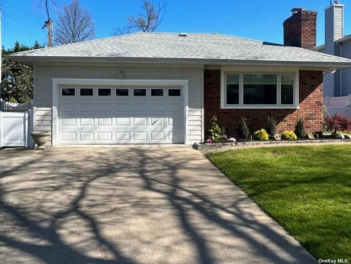 Spacious Ranch in Wantagh Ready to Move In. Featuring Hardwood Floors, Gorgeous Chef Kitchen, Central Air, Duraflame Burning Fireplace, Central Vac, 3 Large Bedrooms, Updated Bathrooms, Great Backyard w/Shed and Outdoor BBQ. Solar power (low electric). Garage and Partial Basement. All Applications Thru NTN
