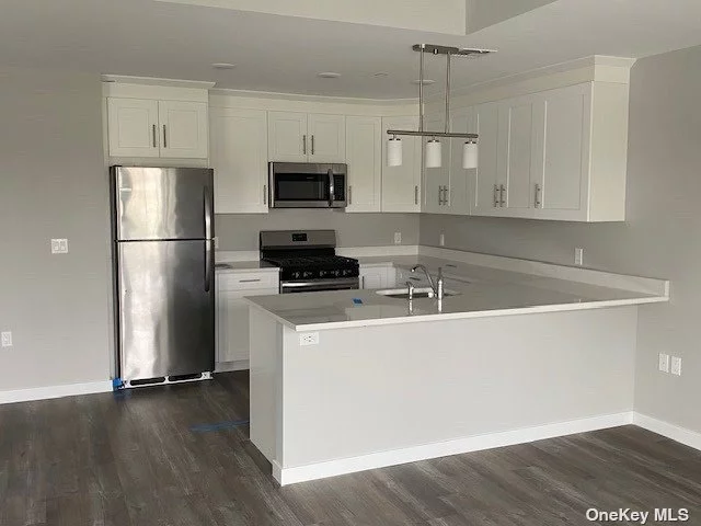 Brand new luxury apartments. Upstairs unit featuring high end quartz countertops and all SS appliances, living room, 2 bedrooms, 2 full baths, upstairs loft, lots of closet space, washer / dryer, CAC, private parking and fitness center. One month FREE rent.
