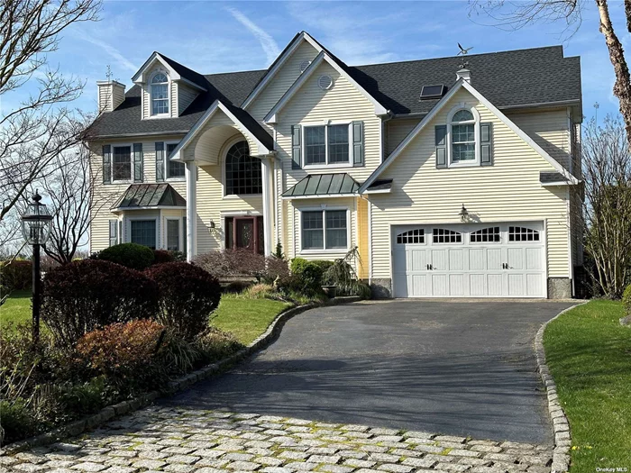 This custom-built colonial boasts 4 bedrooms and 3 1/2 bathrooms on private cul-de-sac. The 1st floor features a foyer with cathedral ceiling, formal living room with gas fireplace, formal dining room, huge eat-in-kitchen (with French doors to deck) adjacent to the family room with wood burning fireplace and rear staircase to the second floor. A powder room and home office finish off the main level. The 2nd floor features the master bedroom with a walk-in closet and en-suite bathroom, 3 additional bedrooms, a full bathroom and laundry room. The finished basement (with 8-foot ceilings) has a full bath with walk out stairs to the backyard and lots of storage. The 6-year-old solar panels, 2-year-old home video security system, IG Sprinklers, natural gas hook-up with generator, natural gas barbecue, full attic with pull-down stairs, 4-year-old central air conditioning and central vacuum system are features you won&rsquo;t find at any other house for sale. This magnificent home sits on a 1/2-acre lot with a beautifully landscaped backyard and in-ground pool making it perfect for entertaining guests.