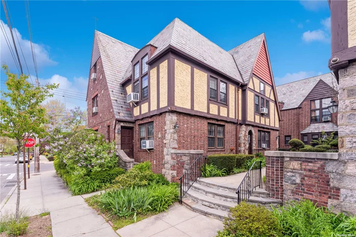 Beautiful Tudor Co-op In the Heart of North Flushing, Corner Unit, Living/Dining Room, Gas Cooking,  Private Storage Space in Basement, Convenient Location w/ near to LIRR, Schools and Shops.