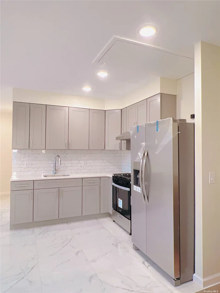 Newly Renovated 4 Bedrooms and 1 Bathroom Apartment. Large Living Room, Brand New Kitchen with Granite Counter Top and Stainless Steel Appliances. Hardwood Floor Throughout. Close to J & Z Train. Close to Everything. A Must See.