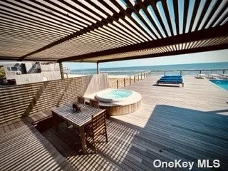 Midcentury oceanfront with generously proportion deck with pool and hot tub. Intimate & inviting, 3 bedrooms, 2 baths. Sun drenched pen living / dining/ kitchen plan spilling out onto pool deck.