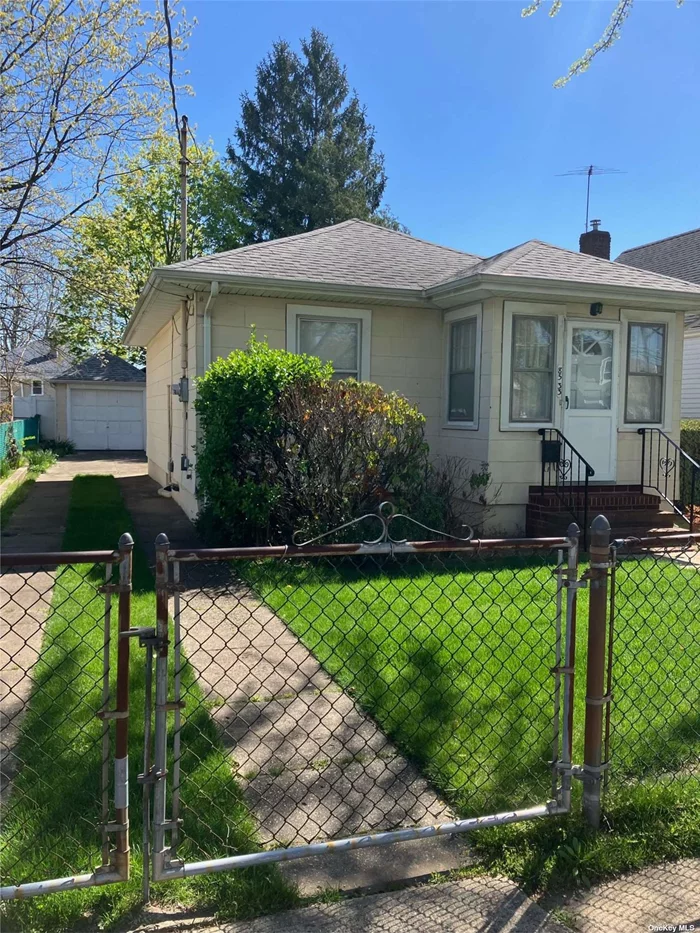 Cozy 1 bedroom cape on a fenced property located in a quiet residential neighborhood. One car detached garage on private driveway that runs to the back of the house. 40x100 Lot, oil/steam heat Major roads and shopping close by. Great starter house with room for expansion.
