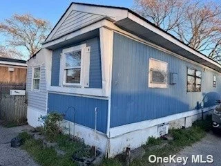 Spacious Mobile Home with four cozy bedrooms, one bath, living room and functional kitchen. Perfect for investors or DIY enthusiasts looking for a renovation project. This property has great potential.