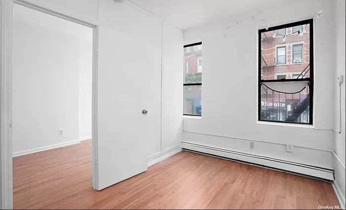 Oversized East Village loft-like two-bedroom already flexed to 3 bedrooms. All bedrooms have windows! The wall can also come off and can be returned to 2 bedrooms. Full kitchen, renovated bathroom, hardwood, floors, high ceilings. PERFECT LOCATION! CLOSE TO SUBWAY, NYU, TRENDY BARS, RESTAURANTS, AND THE BEST NYC HAS TO OFFER! AMAZING LOCATION CLOSE TO ALL - including trains, trendy restaurants, bars, parks, and NYU! Easy application process! Bright and VERY SPACIOUS!