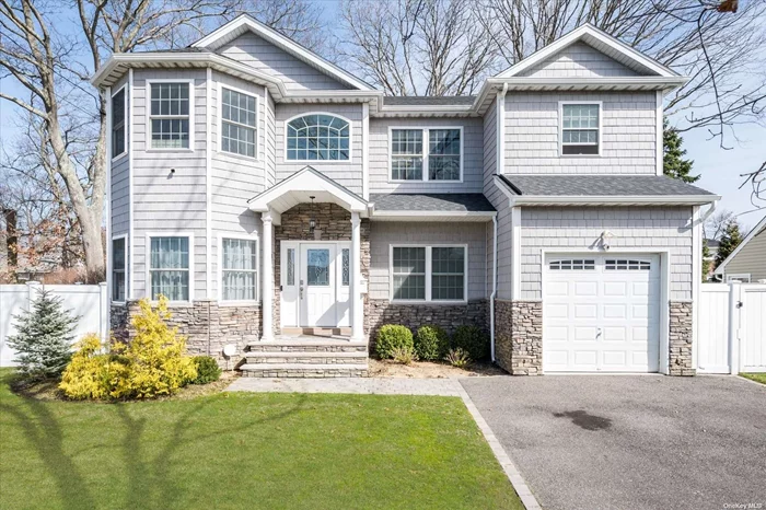 Welcome to this Stunning 4 Bedroom, 2.5 Bath Colonial in Massapequa. Completed in 2019, this home exudes luxury with meticulous attention to detail. When you enter, you are greeted by a double-height foyer, open to the Formal Living Room on the left and Formal Dining to the right, excellent for any occasion. The Kitchen is a Chef&rsquo;s dream, with quartz counters, top-of-the-line GE appliances and seating at your oversized island. The kitchen is completely open to the large living room with a fireplace, just perfect for entertaining. Upstairs you&rsquo;ll find the Primary Oasis, complete with a huge walk-in closet and ensuite bath. There are 3 more generous-sized guest bedrooms upstairs along with another full bathroom. Did I not mention, the second floor Laundry Room?! Head outside to enjoy your private yard, with custom masonry, landscaping and in ground sprinklers to keep the lawn pristine. Natural Gas heating and cooking. Located in Flood Zone X. Massapequa School District.